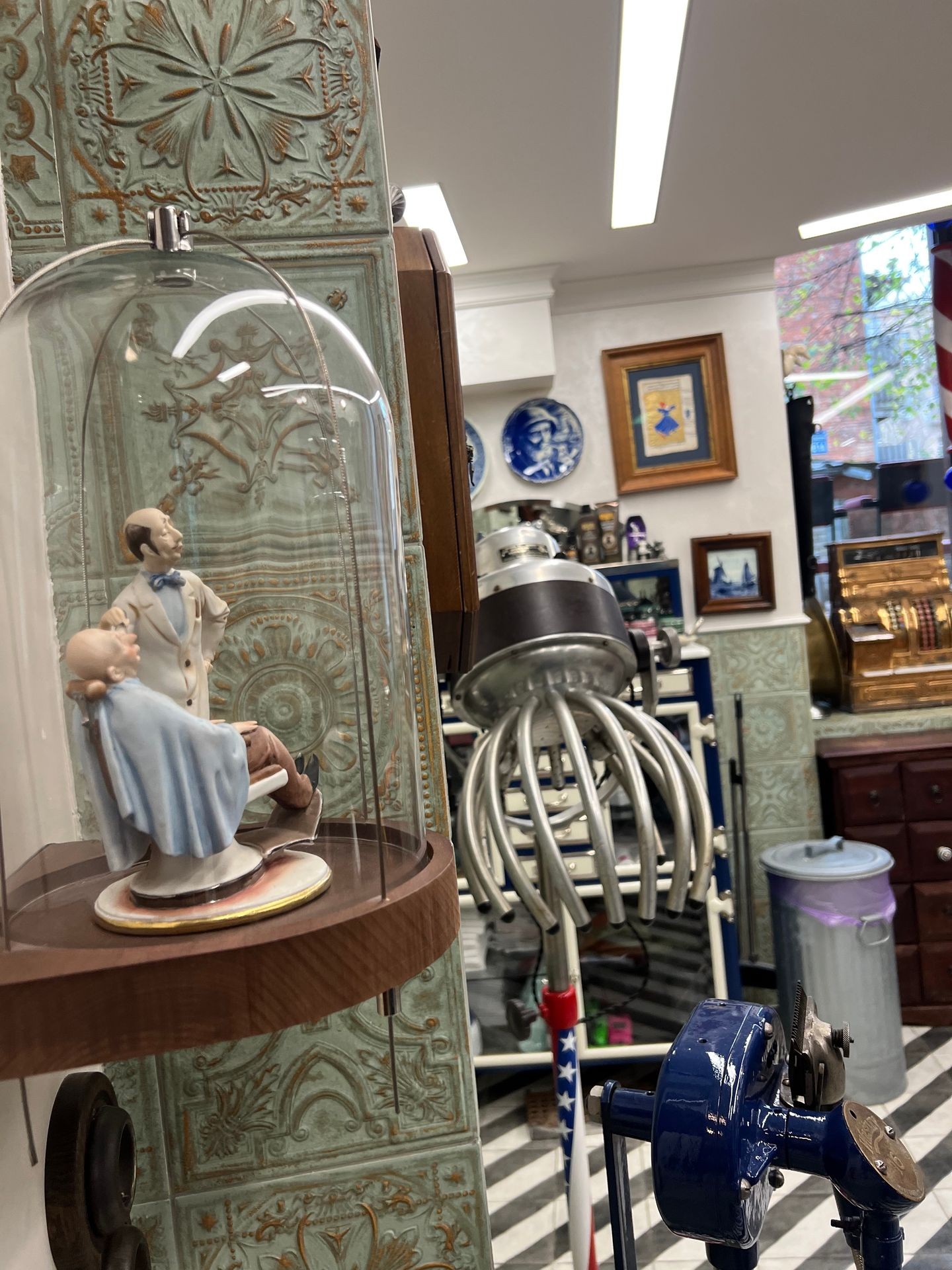 Vintage barber shop interior with decor and old barber equipment on display.